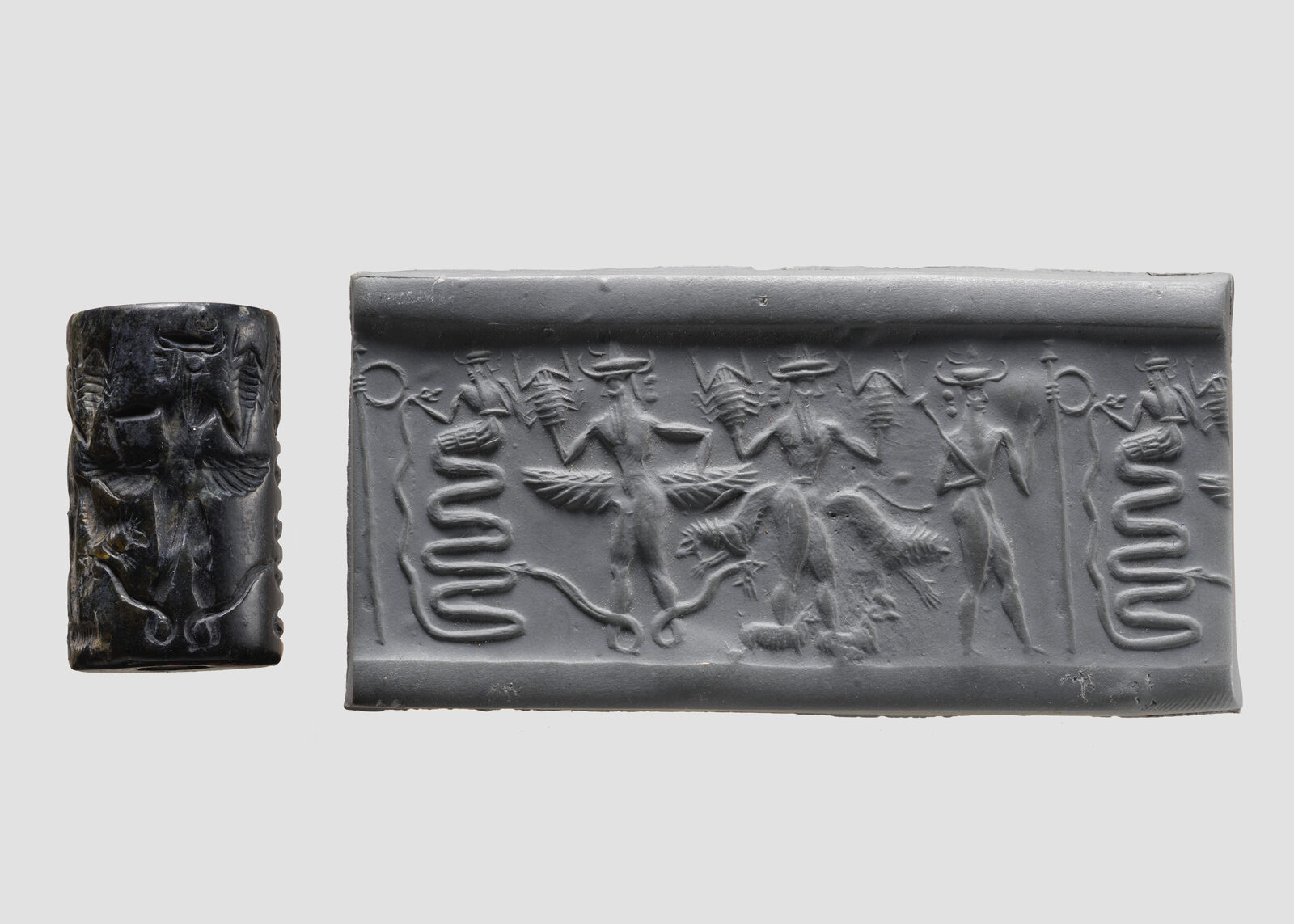 Akkadian cylinder seal: snake god and deities with hands raised in salute, ca. 2350–2150 BCE