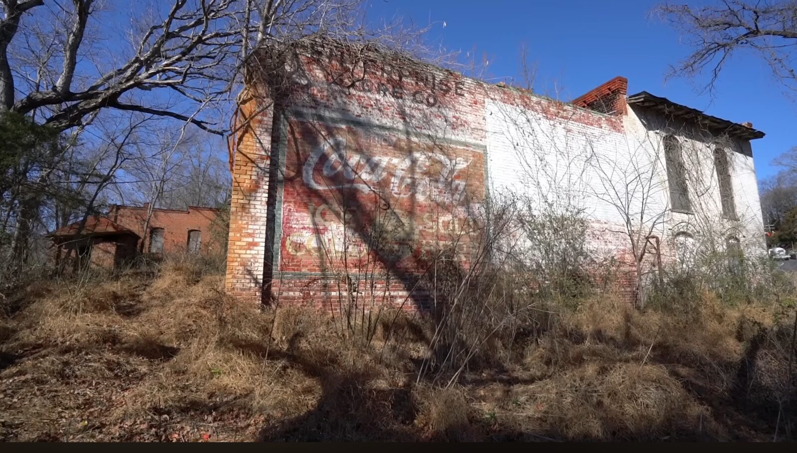 Ghost Coca-Cola sign on brick wall, Coleridge NC